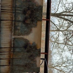 Landscape painting of trees and water